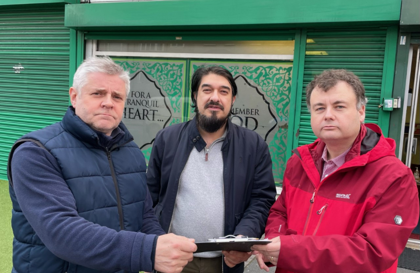 Cllrs Male (left) and Ridley (right) with Zaid Rehman