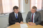 Cllr Gary Ridley and Cllr Peter Male discussing the budget proposals