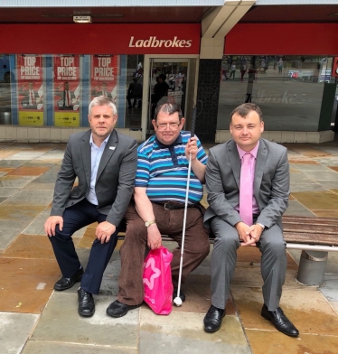 Councillors with Mr Jones outside the Ladbrokes branch in Coventry.