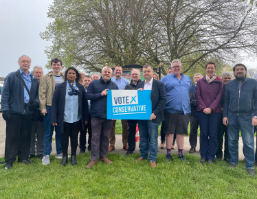 Councillor Peter Male and Gary Ridley with councillors, candidates and activists